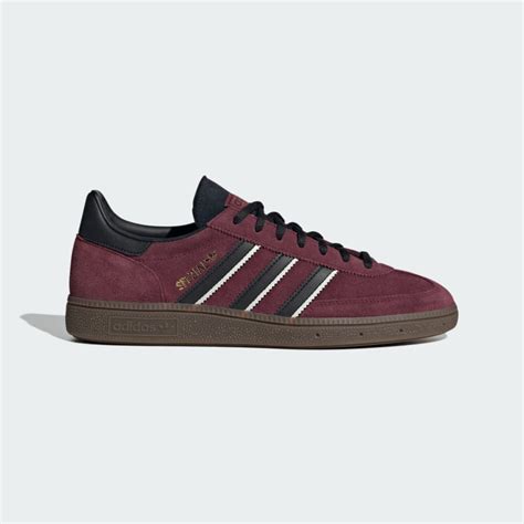 burgundy adidas handball shoes